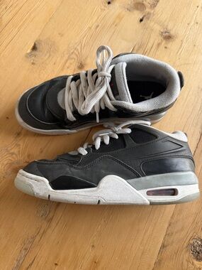 Youth Nike Air Jordan 4RM Black and Gray Casual Sneakers with Cushioned Support